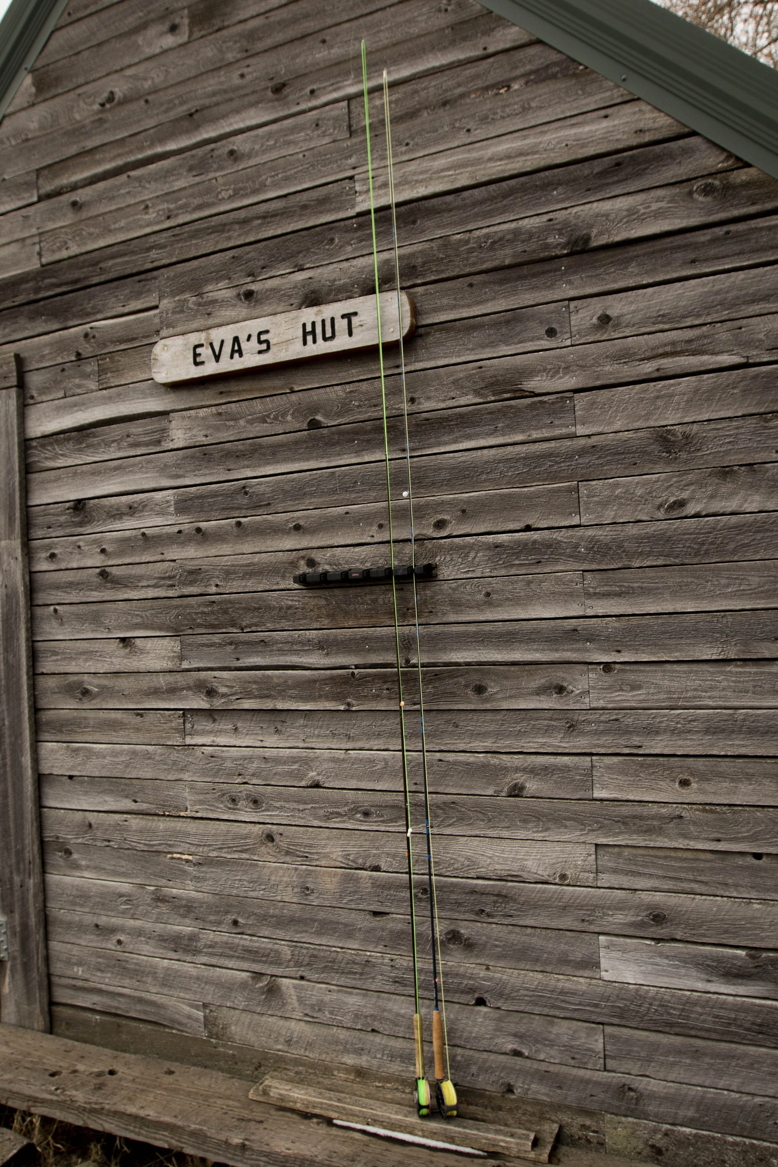 Eva’s Hut sign at a Paradise Valley spring creek in Montana, a well-known winter fly fishing location