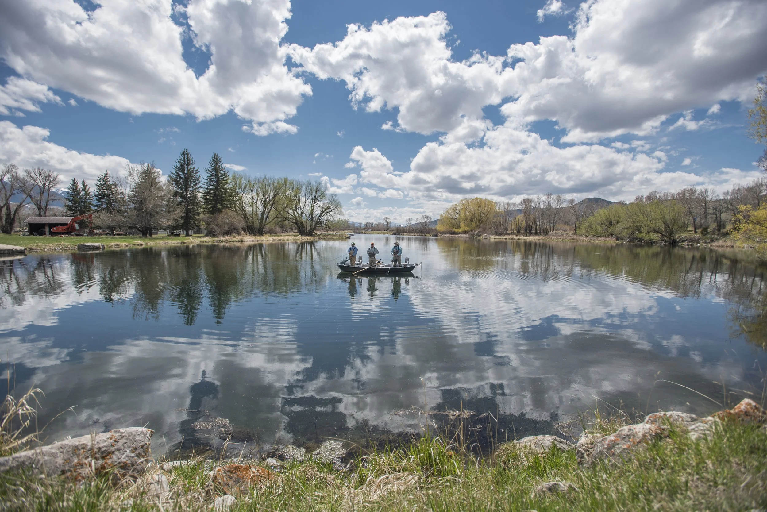 Paradise Valley spring creek reflection under spring clouds near Livingston Montana
