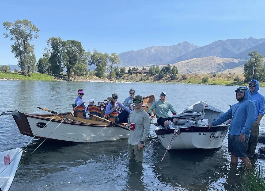 Hybrid river trip with fishing boat and wooden boat on the Yellowstone River in Montana.