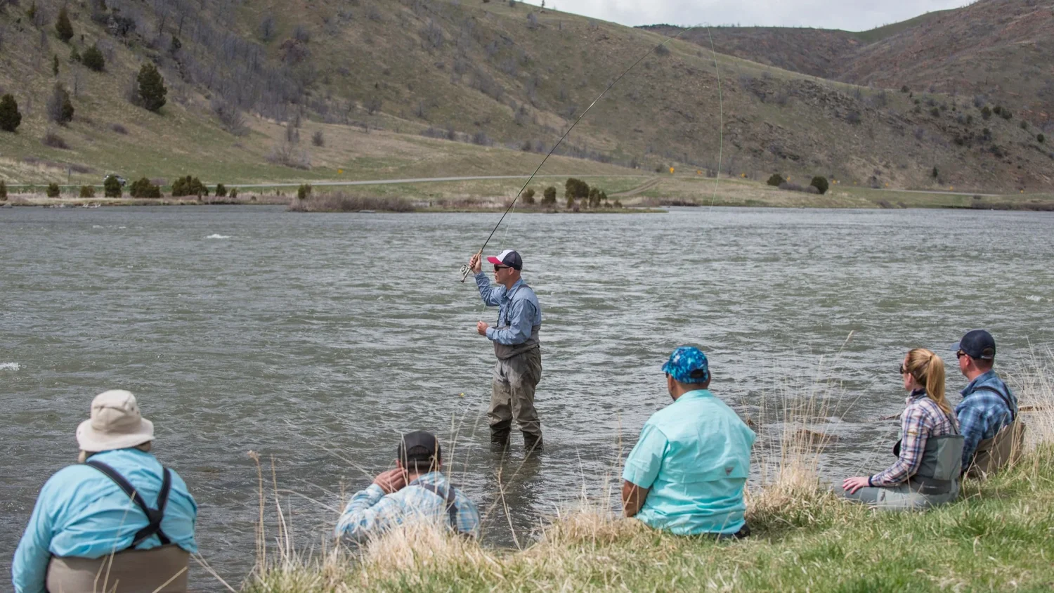 Group casting instruction on the Madison River in Montana during Montana Trout Camp