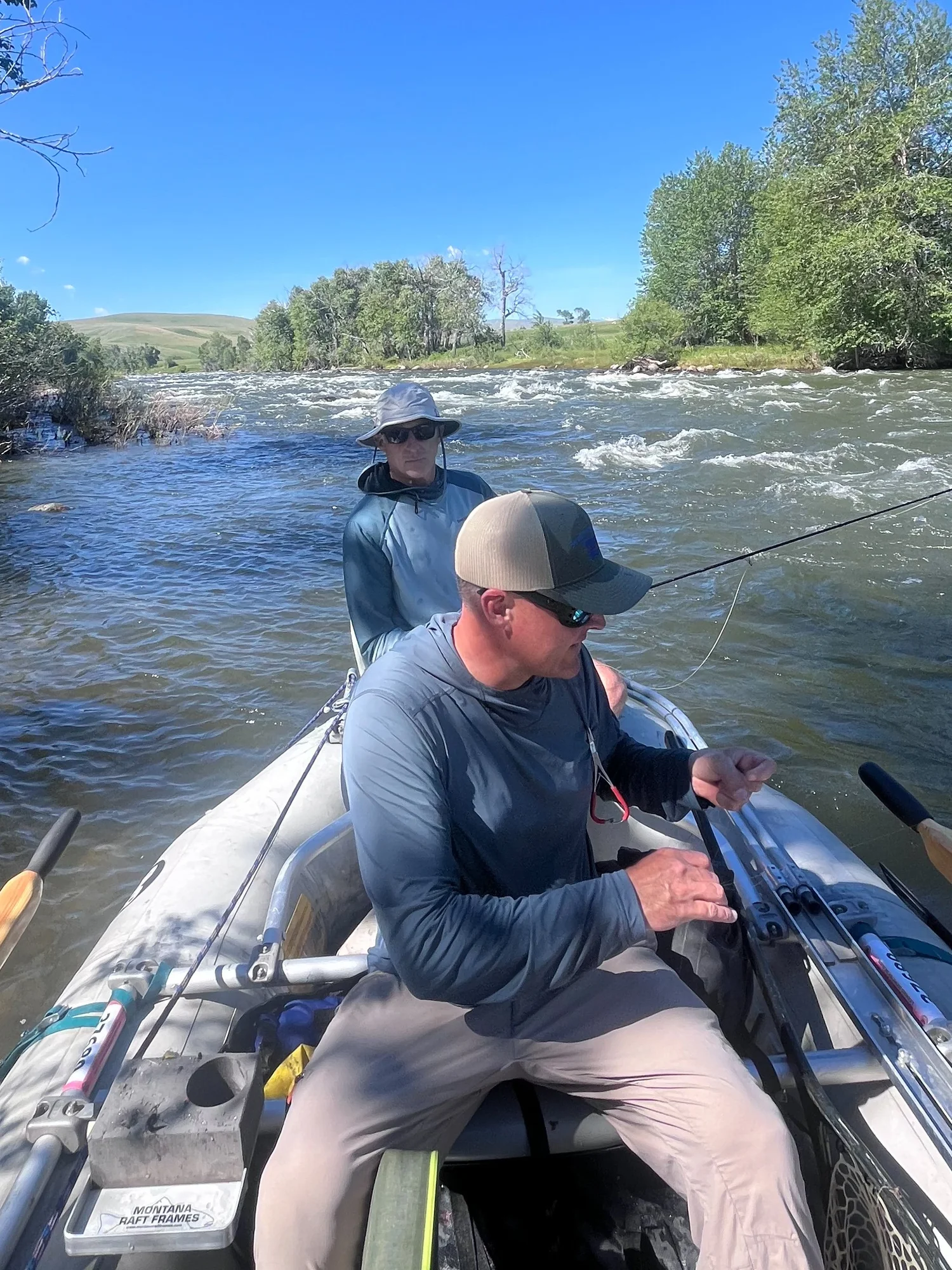 Boulder River Montana raft fishing scene showing clear summer flows and lower river access conditions