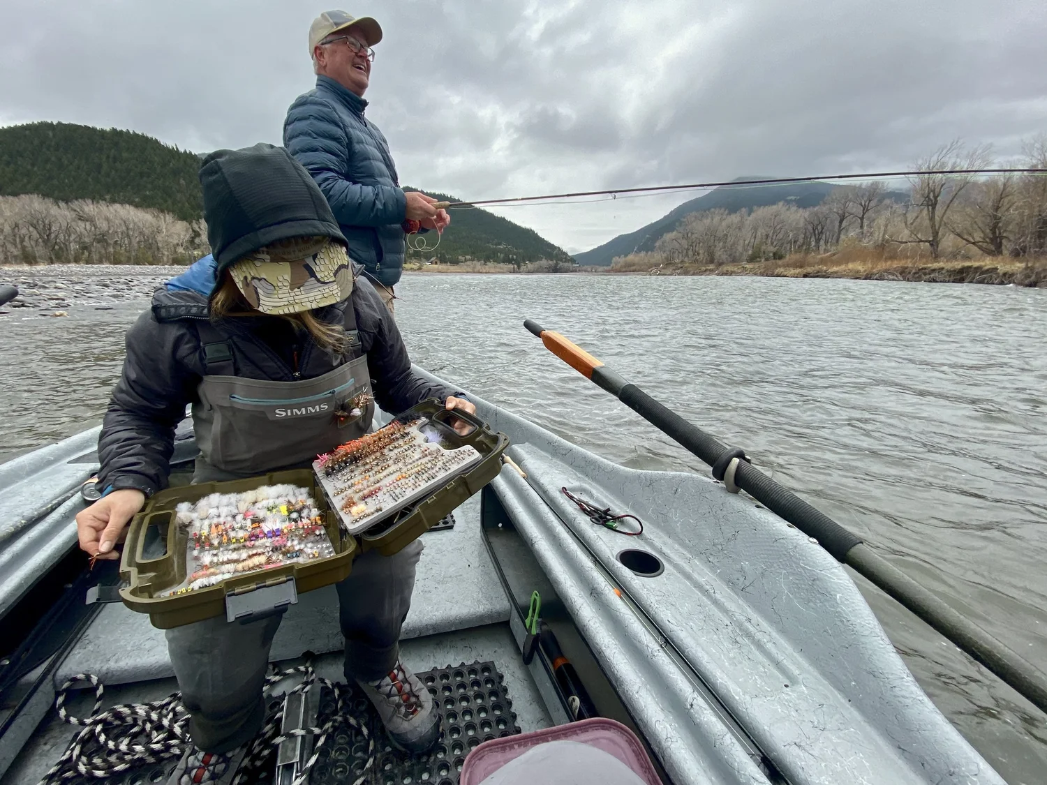 Guided fly fishing from a drift boat on a Yellowstone River hybrid trip near Livingston Montana.