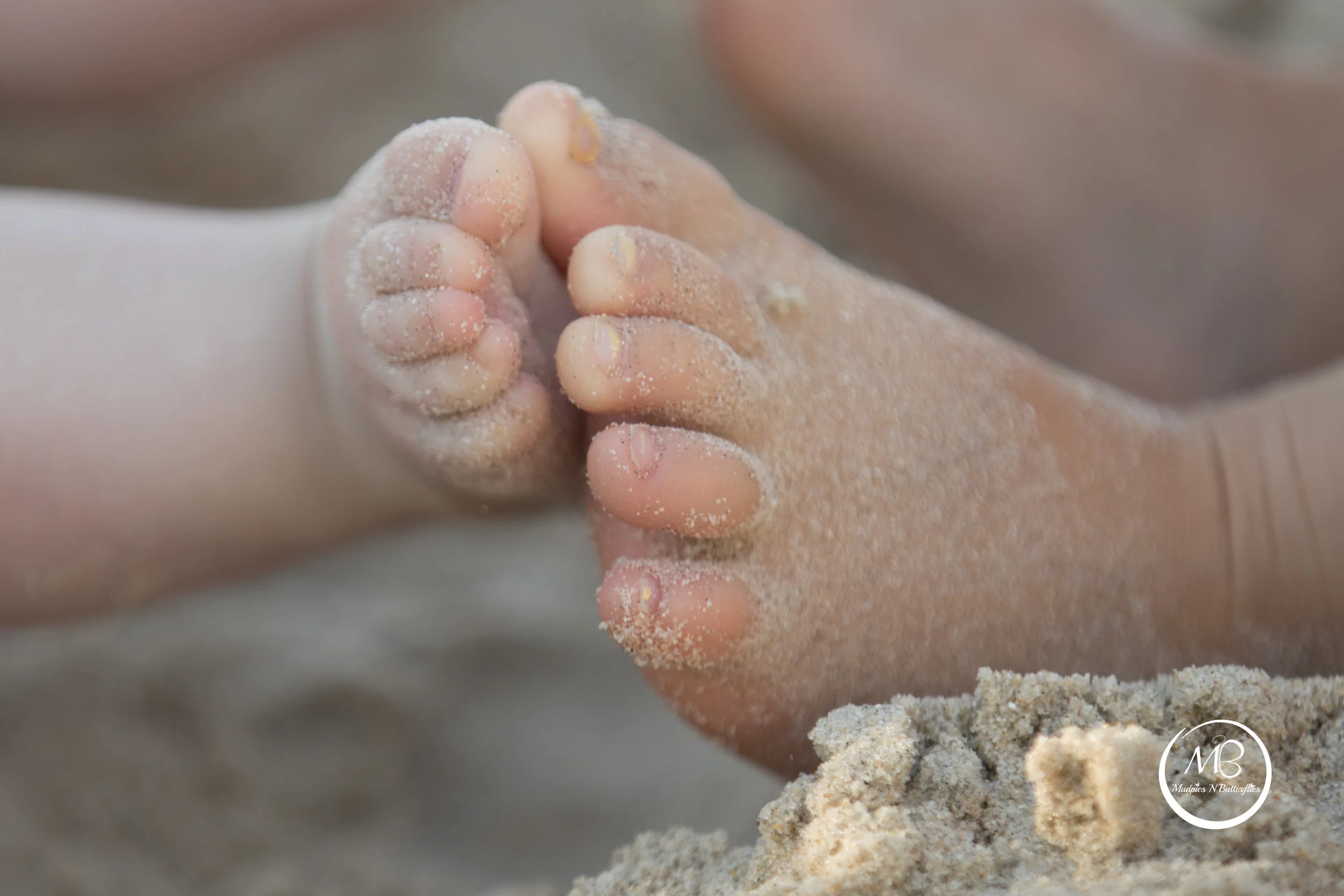 Sand between our toes...