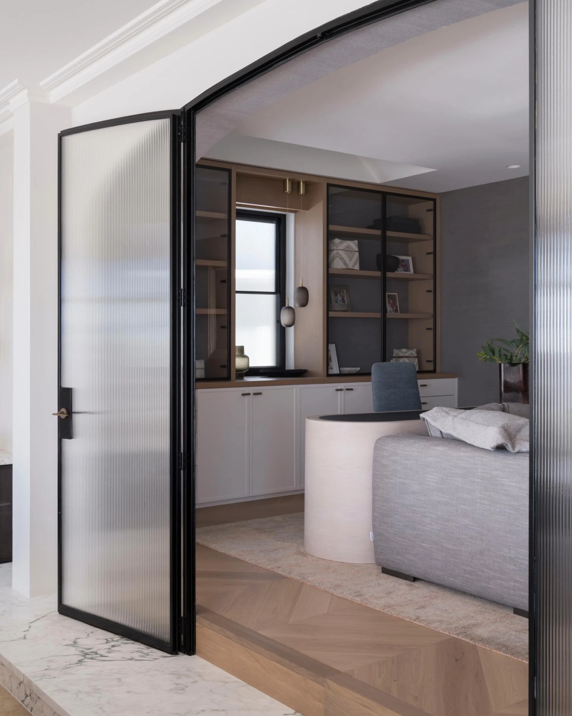 A once dark and closed-off rumpus room, thoughtfully reimagined for the way this family lives today.

One of the biggest transformations we incorporated into the space was opening the hidden window that sat behind the original bookcase, bringing natu