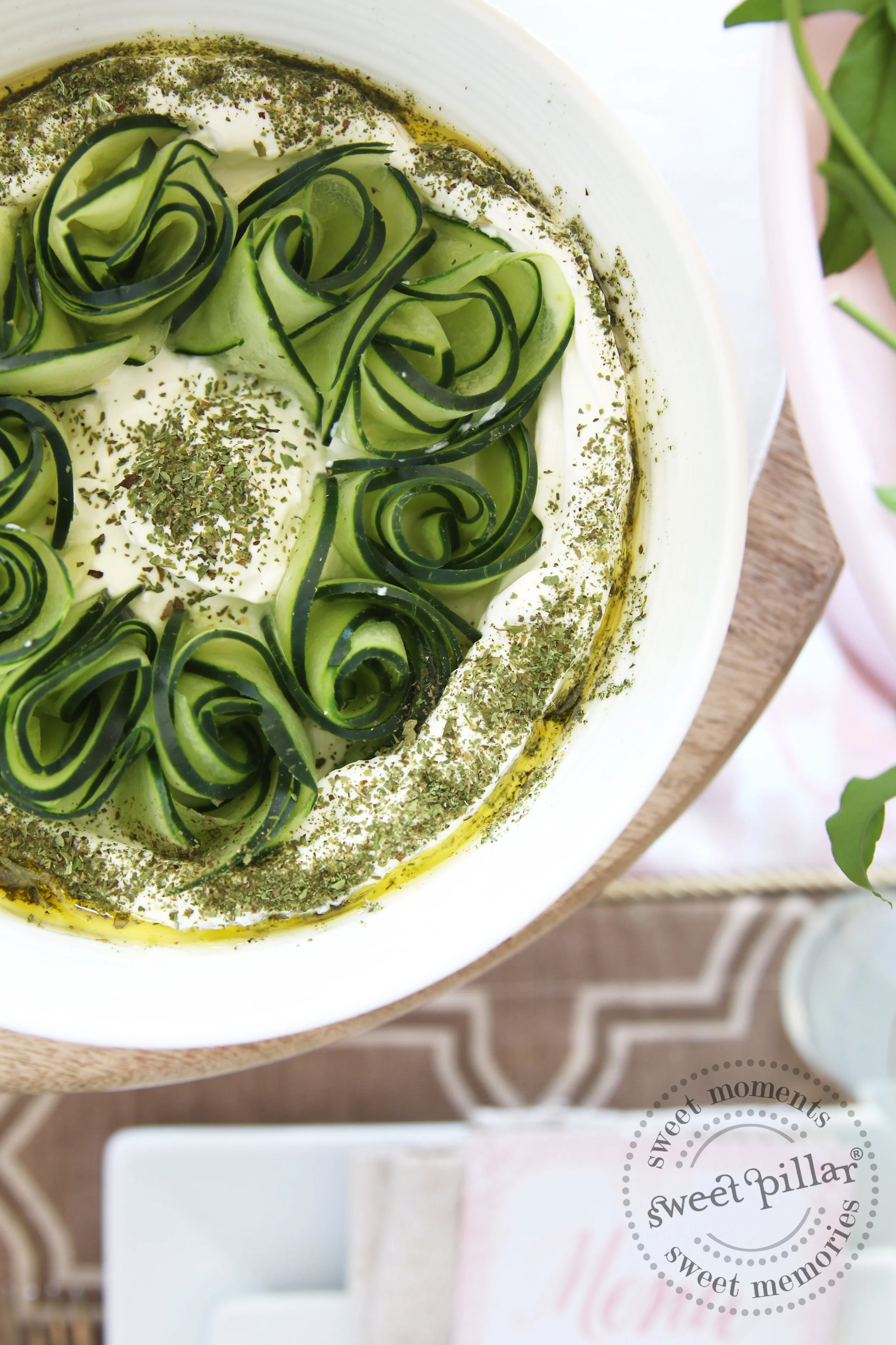 I sliced cucumbers paper thin and then rolled them to form roses