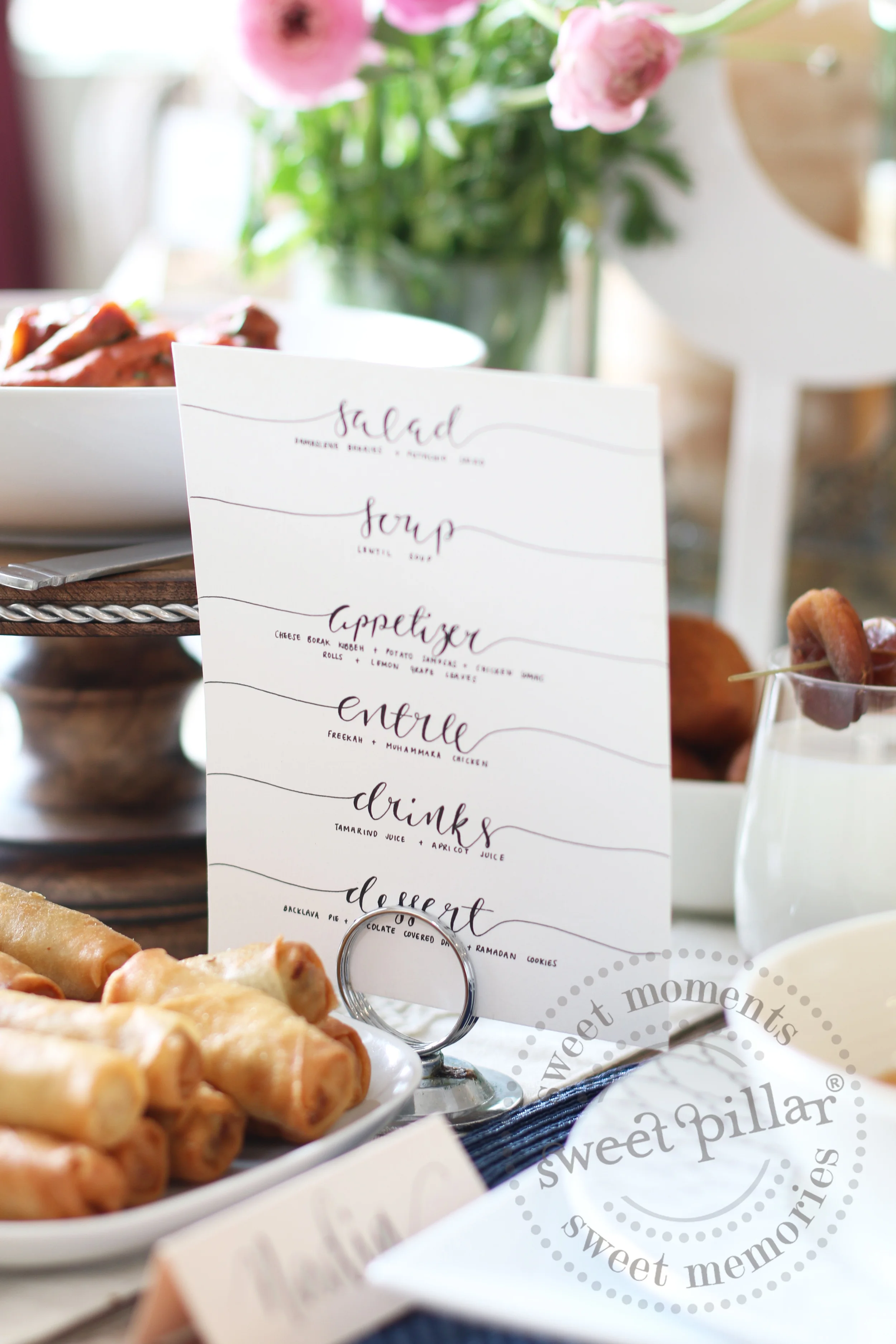 http://www.eighthandautumn.com talented ladies hand made the beautiful menu in Arabic & English 