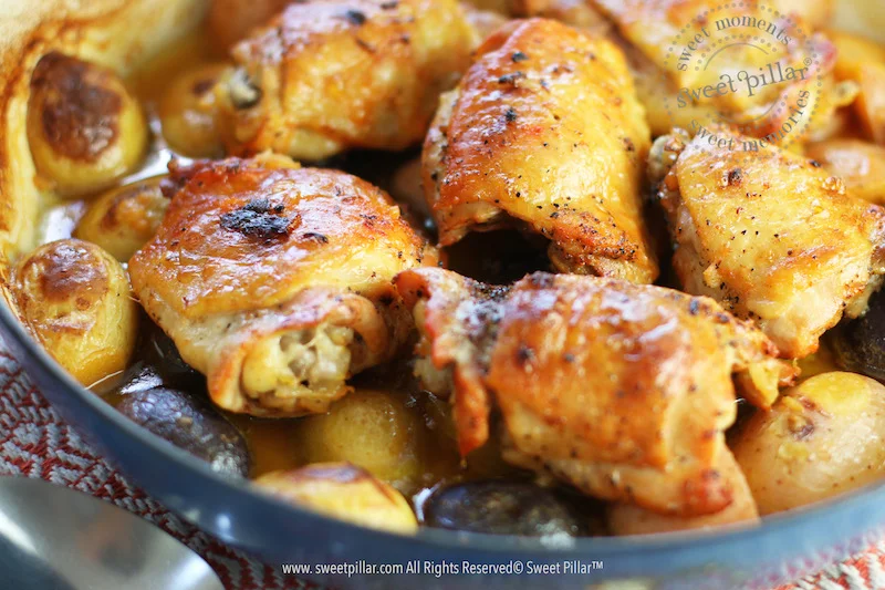 Juicy Baked Chicken & Potatoes in Mouthwatering Lemon Garlic Sauce