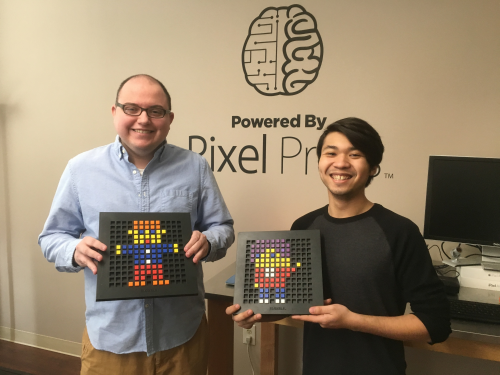 Phil Stortzum (left) and Richard Centeno (right) show off their Bloxels board creations.