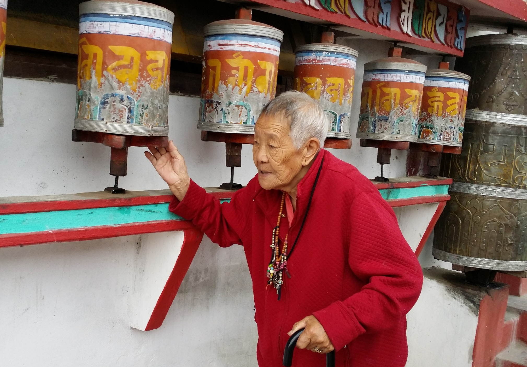 Lama Gonpo's sister, Yogini Tsarak Sonam Lhendu spinning prayer wheels at Zangdok Palri Monastery, Kalimpong, India (2015)
