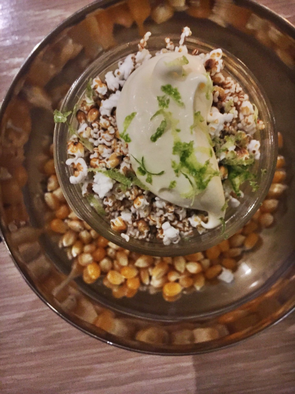 The buttered popcorn pudding offers up some next-level interplay of textures and flavors: creamy pudding, crunchy, cracked corn, sweat butter & eye-lash curling lime curd.