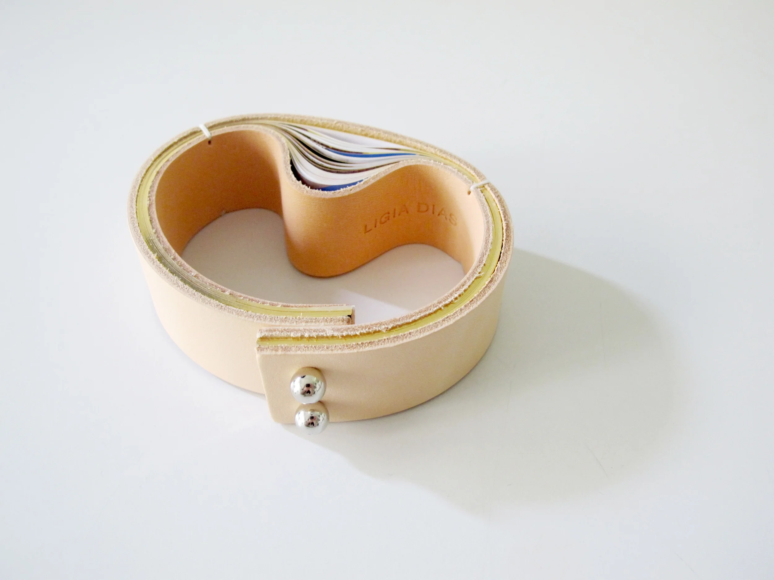 Magazine , 2014, cuff Vegetable-tanned leather, four-color print, 22-carat gold, palladium-plated brass and stainless steel. Ed. 30 + 4 AP Available to DoPe Press Publishing House