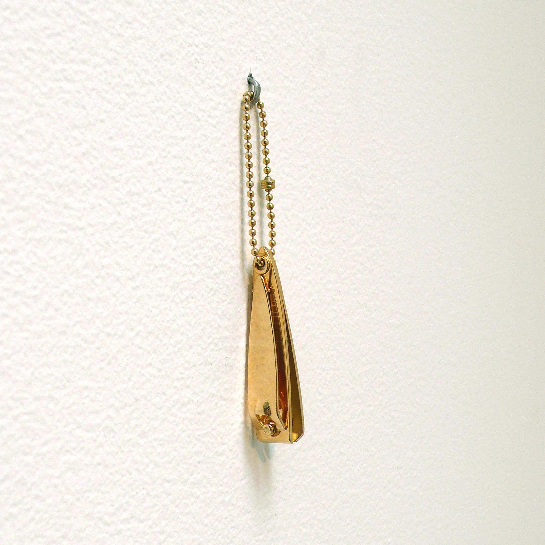 Valentin Carron, Untitled, 2009, 750 yellow gold, 1,2 x 5,5 x 1,5 cm, weight: 30 g. Edition 2/5. © Valentin Carron, courtesy of Galerie Eva Presenhuber, Zürich/New York