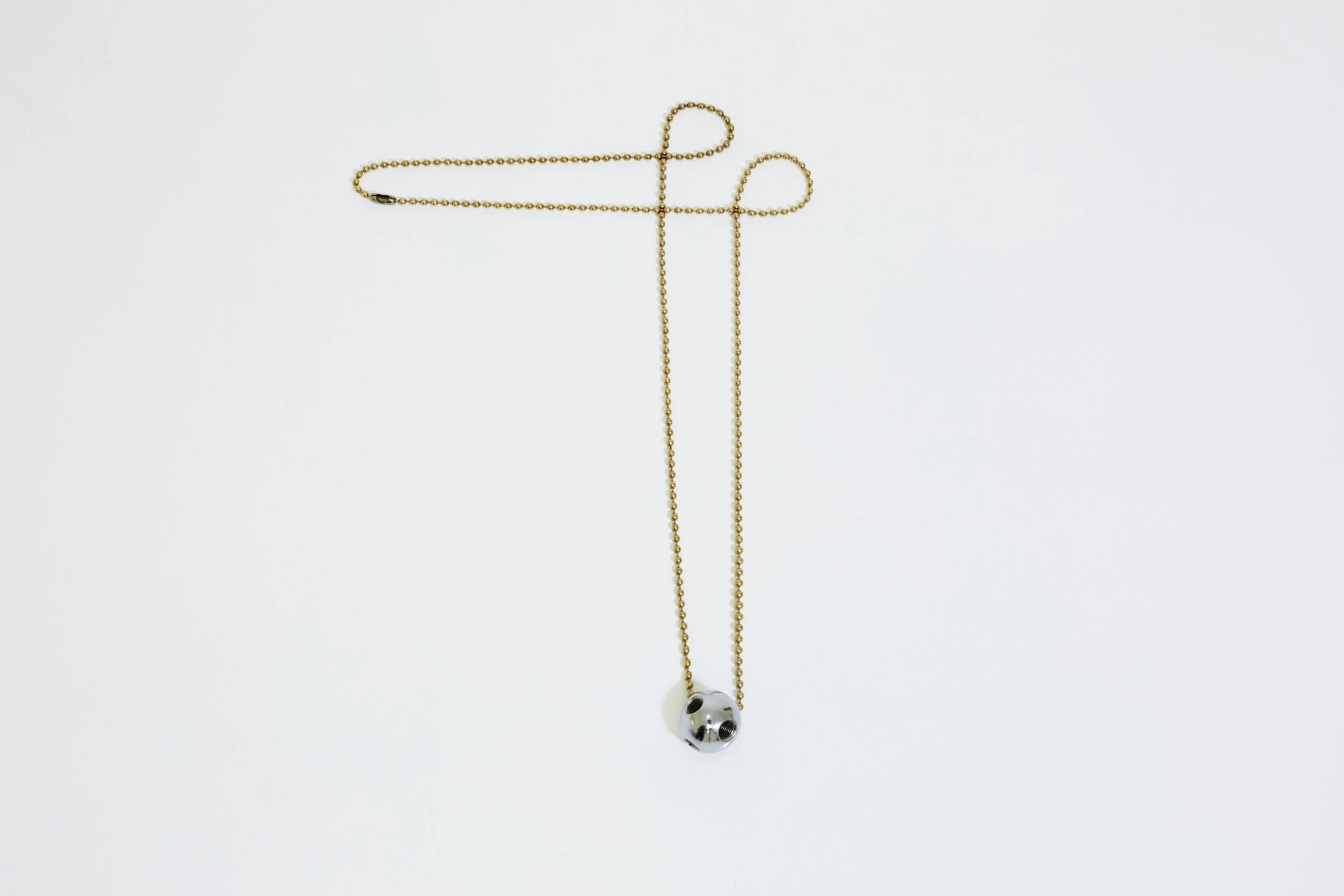  USM Fetish, 2017, chromed steel, gold plated brass. Private collection Paris. Photo © Alicia / complete Works 