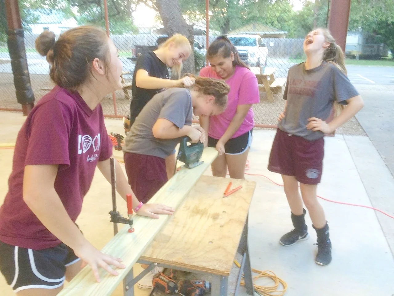Ponytails and Power Saws