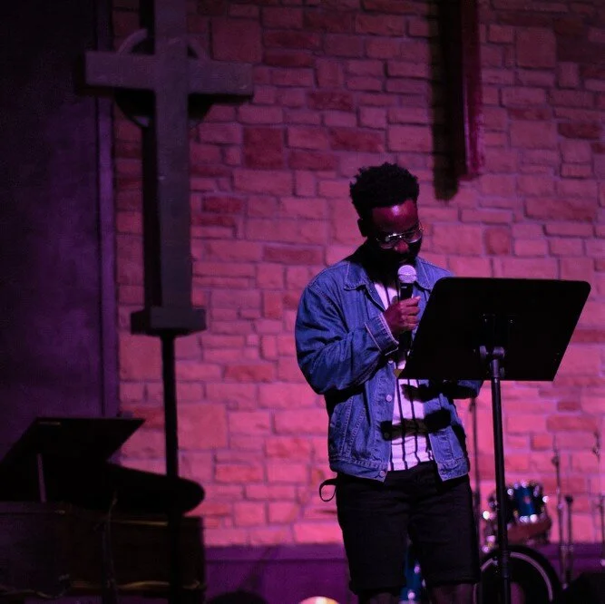 charles in worship.jpg