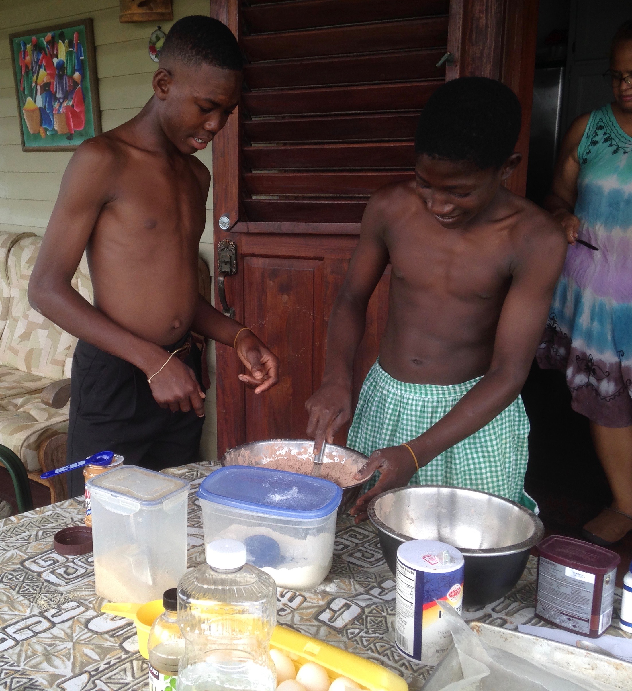 Arleen teaching special needs students to bake cookies