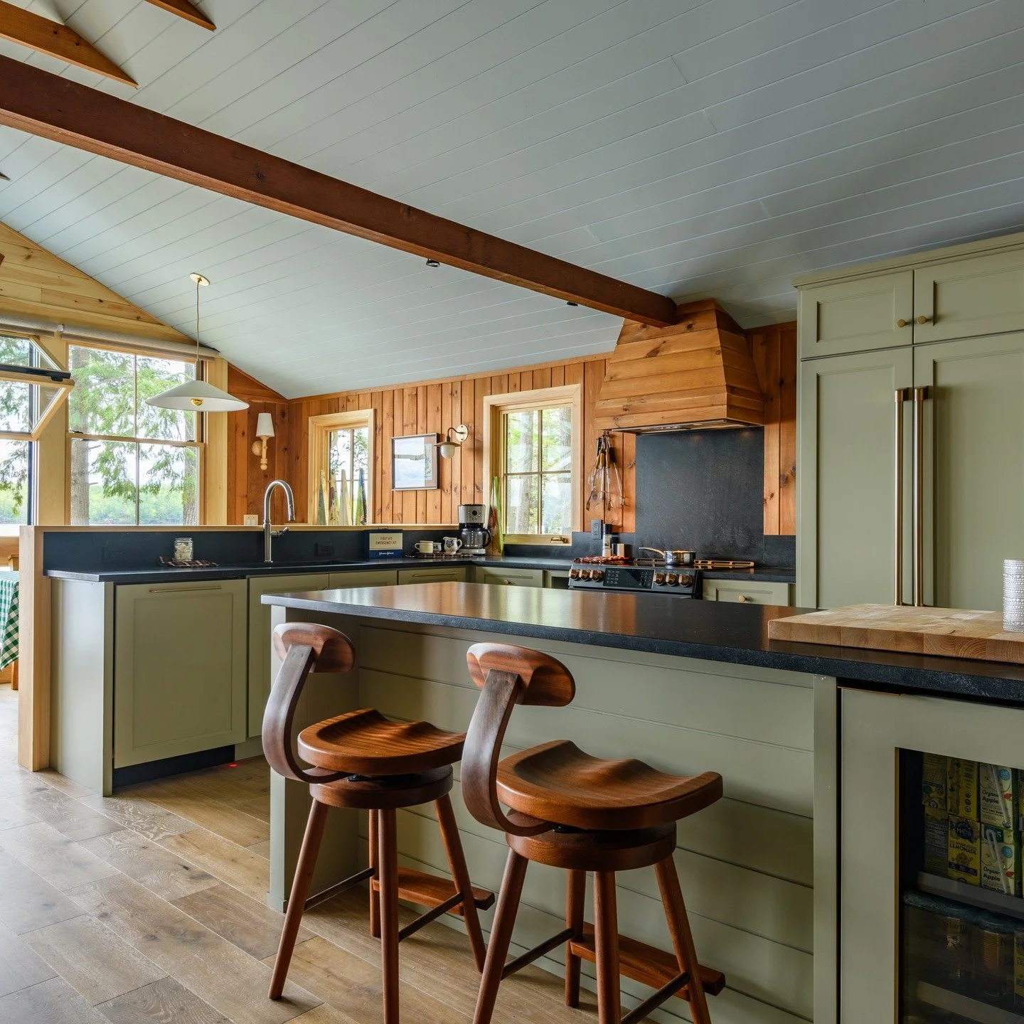Dreaming of lake life? 🌿✨ Our latest install at a Naples, Maine lake house blends modern function with timeless charm. Every detail—from the sleek custom cabinets and soft-close drawers to hidden utensil & cutting-board pullouts—was