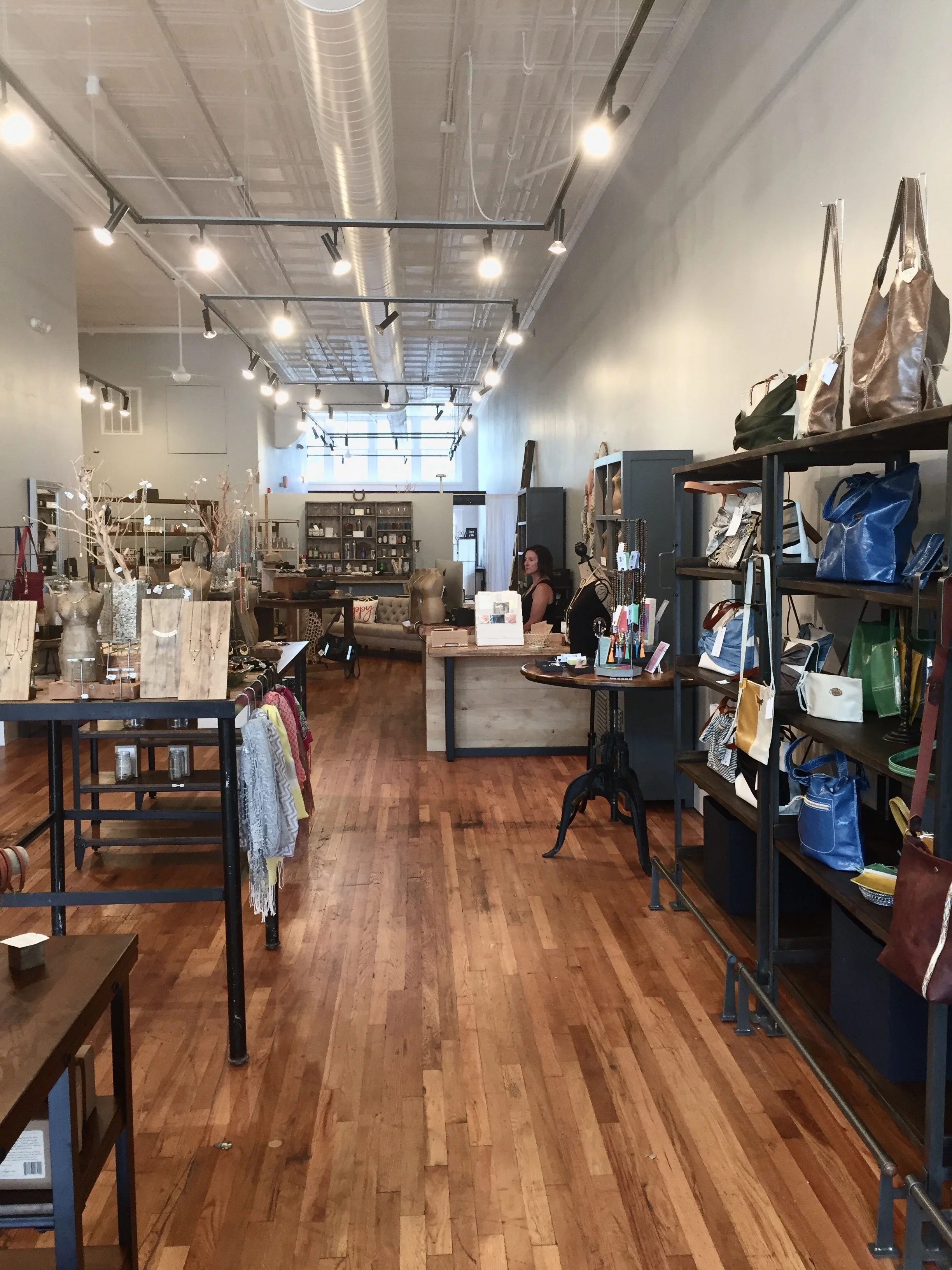 embellish Asheville owner Barb Skupien in her domain.