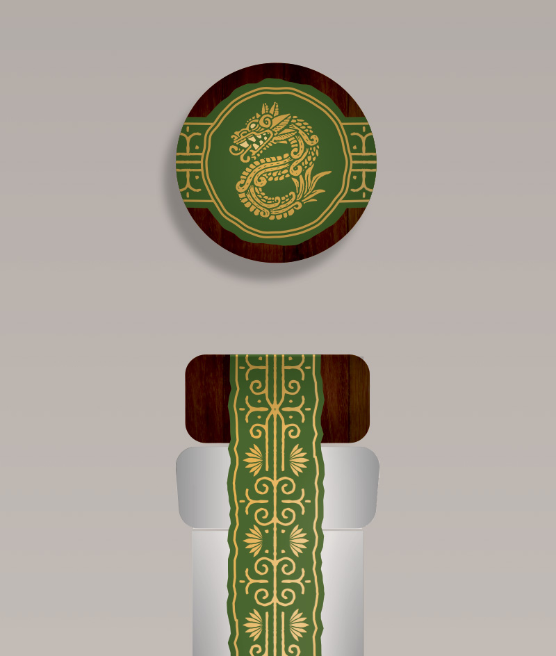 2. I think the idea for the "coin" on the top is an excellent idea! I took elements of the boarder on the main label to create a pattern for the band which goes down the neck. I am very happy with how it turned out.
