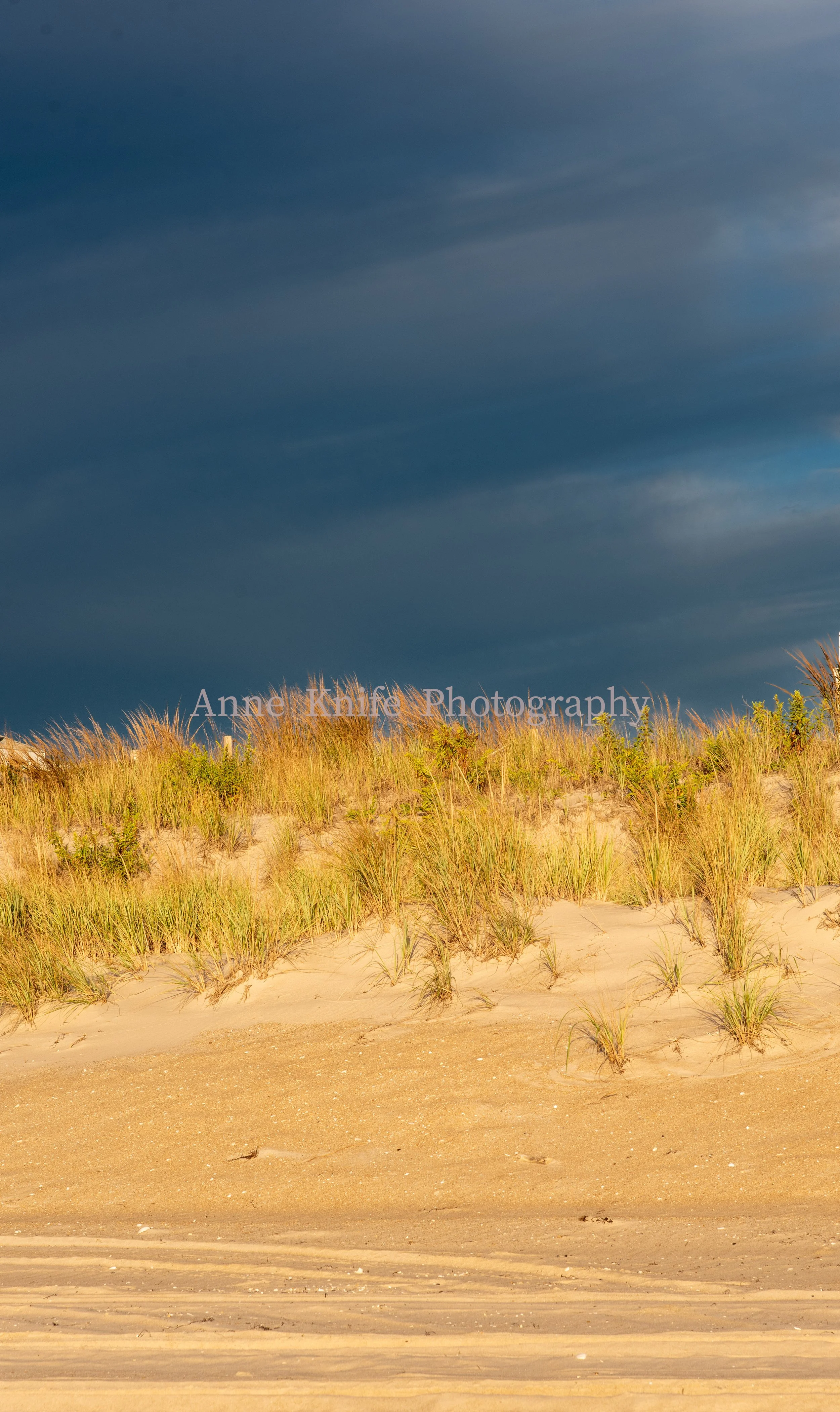 Sunrise in a storm watermarked.jpg