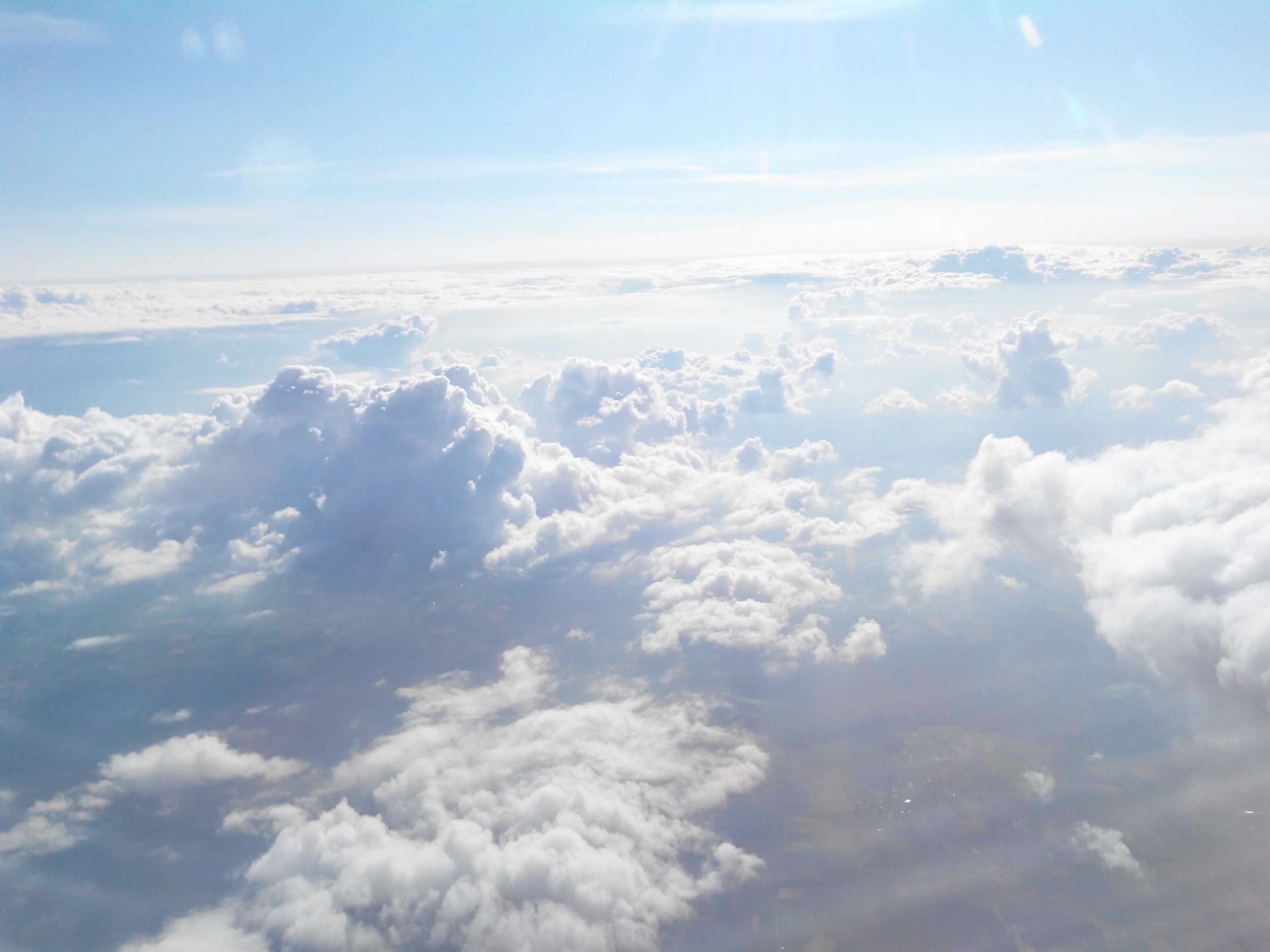 clouds-cloud-aircraft-flight-above-the-clouds.jpg