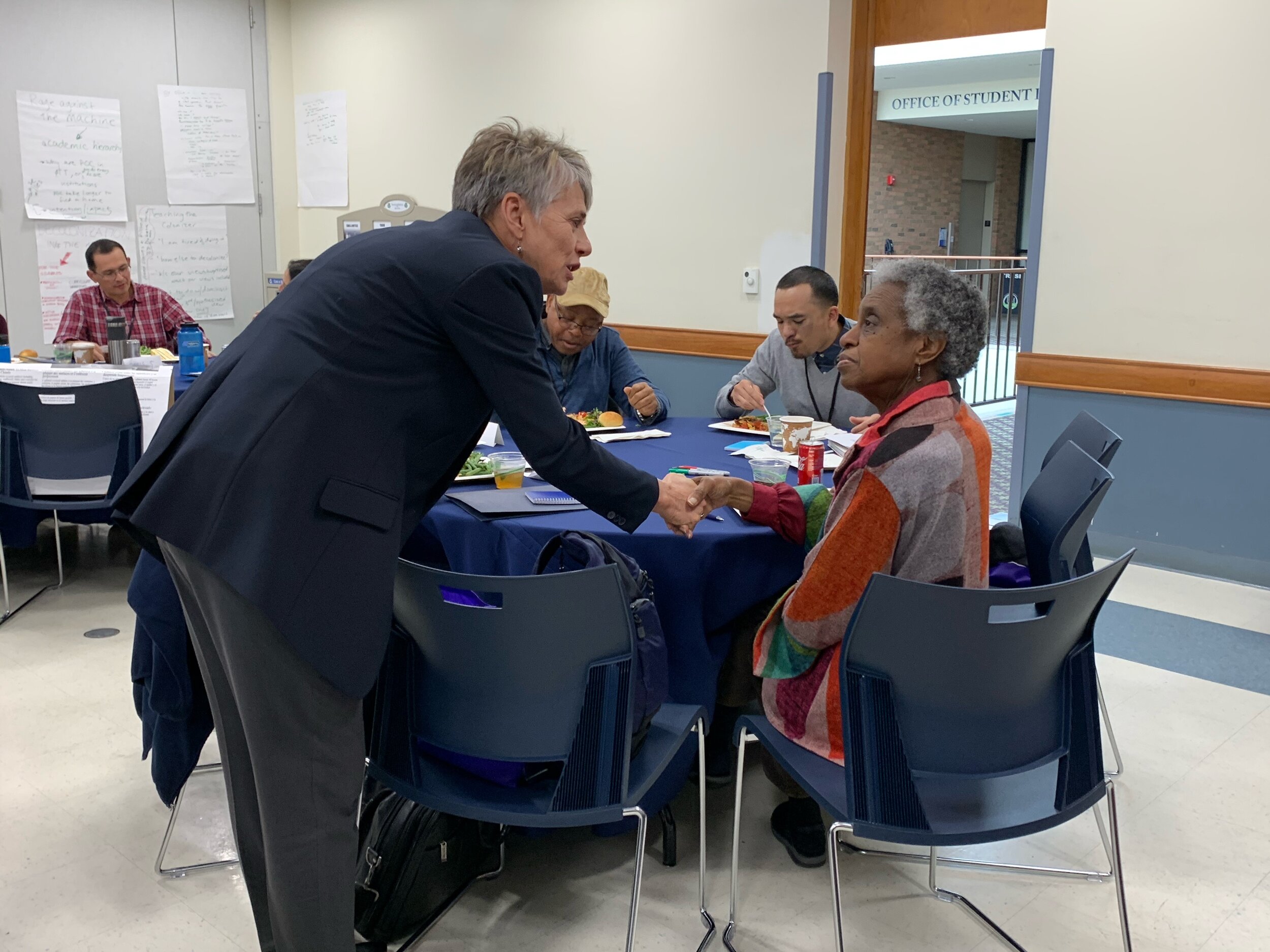 Franklin &amp; Marshall College president Barbara K. Altmann, PhD greeting professor emeritus of History Emma Lapsansky-Werner, PhD of Haverford College.