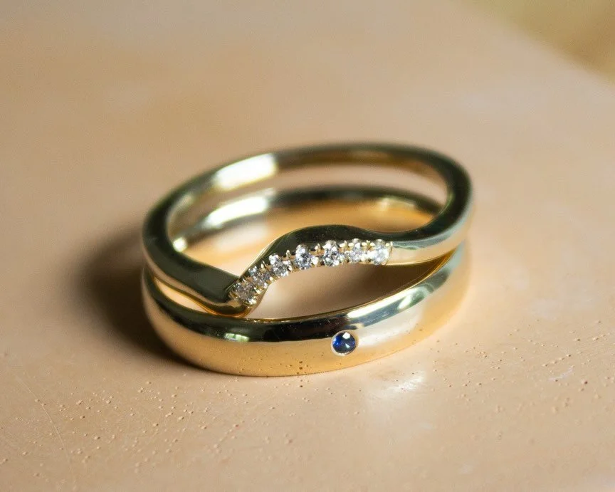 ✨another jewelry project☁️

I had the privilege of designing and creating wedding rings for two of my friends (way back in June 😅)! 

&bull;The groom&rsquo;s ring was a modification of a typical 14K gold band featuring a flush set sapphire, a stone 