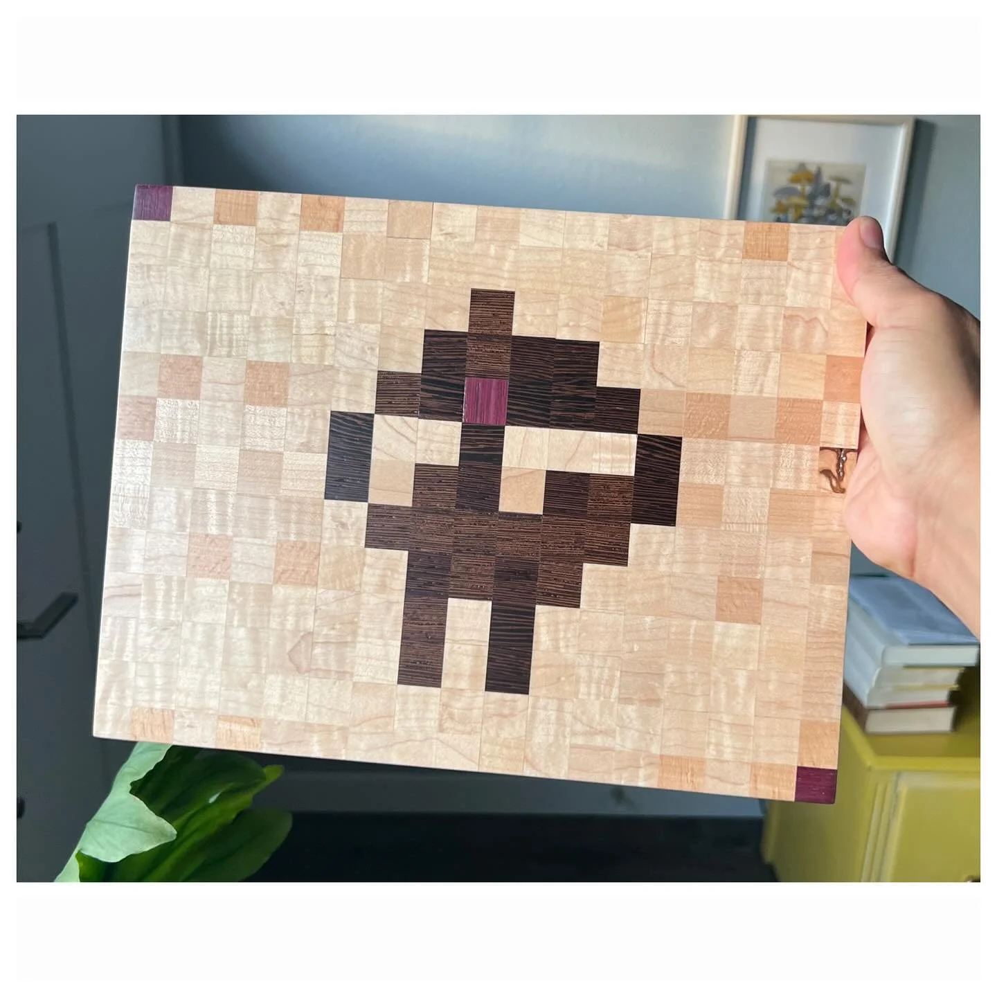 METAL FACE rendered in wood 

I love MF DOOM; his verses, his beats, his mantra. I also love woodworking. So I combined the two and created the first of a few MF DOOM cutting boards and rolling trays. The woods: curly Maple, Wenge, Purple Heart.

I h