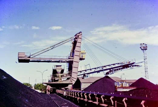 Contrast of old and new. At the coal terminal of Rio Gallegos, YCF operated a relatively-modern coal transfer system to create stockpiles of coal from which ships would be loaded. This equipment is still in operation today.