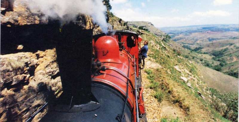 Girdlestone leans out the cab of ACR 141 as it powers up Wilson's Cut. Note the lack of smoke from the stack. Photo: ACR
