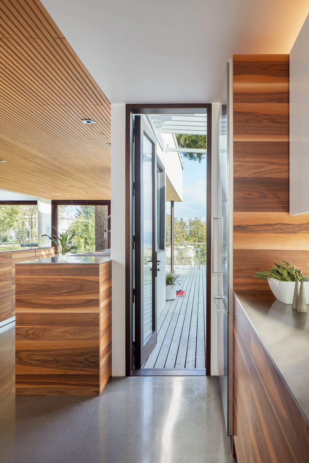 Madrona House kitchen cabinets and view to exterior