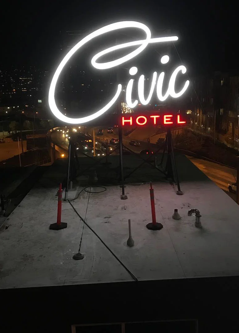 A new, iconic neon sign, created by Noble Neon adorns the roof, visible from southbound SR99 and the neighborhood.