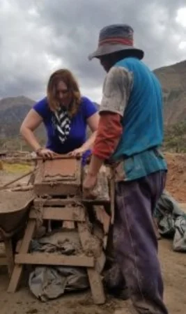 Learning how to hand craft roof tiles in Peru