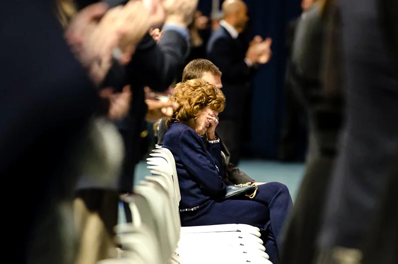 Sue Paterno, wife of the late Penn State football coach Joe Paterno, being overwhelmed with emotion after receiving a standing ovation when entering the Bryce Jordan Center for her husband's memorial service, State College, PA, January 26, 2012.