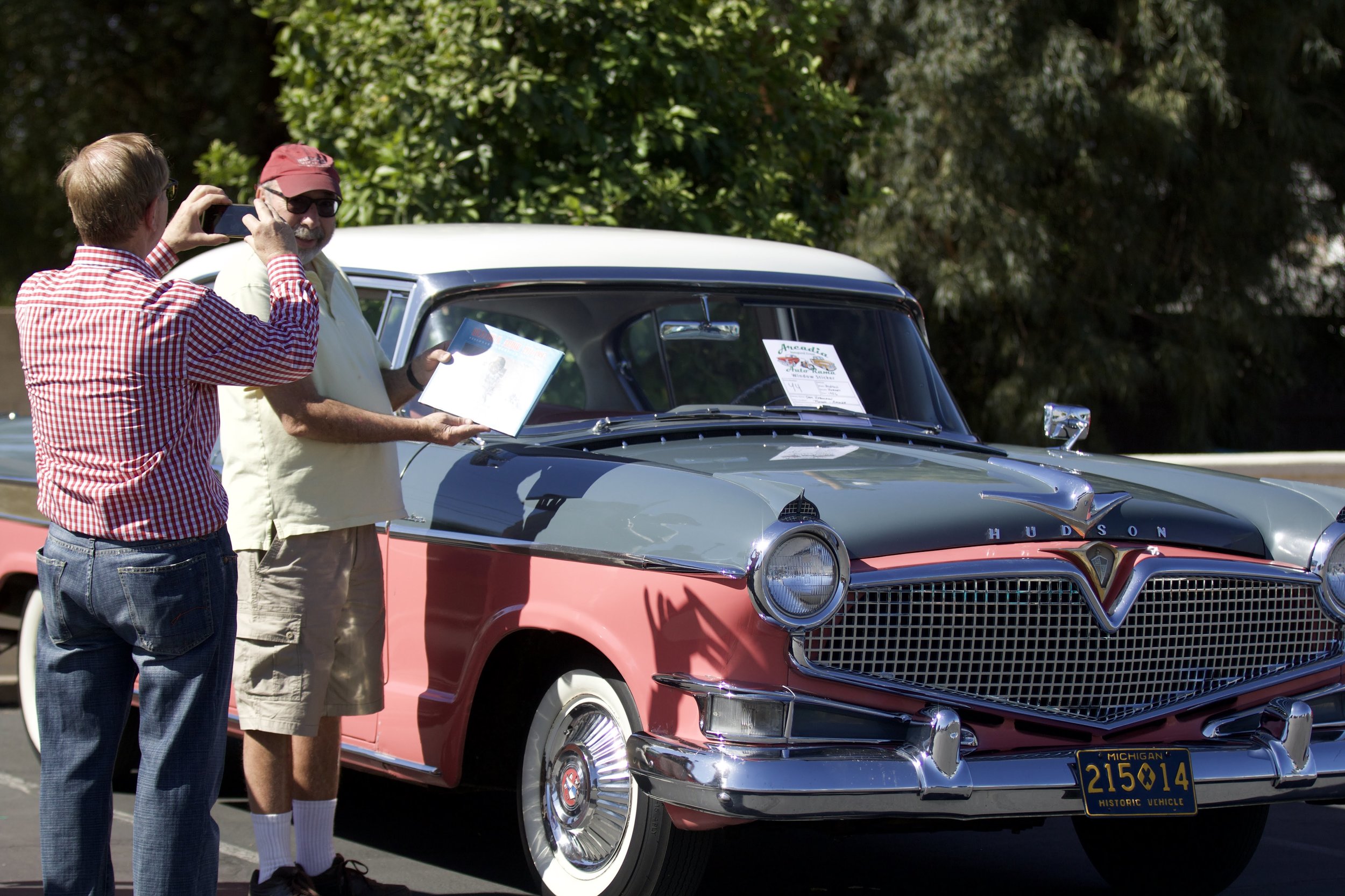 Sam Haberman and his 1956 Hudson Hornet. Gerrit Steenblik, Founding President of ACMNA is taking the picture