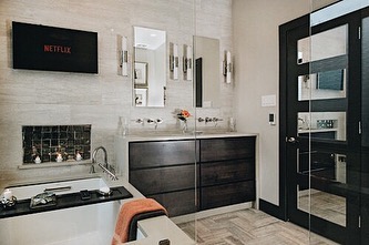 Happy Tuesday! Who could use a nice bath and Netflix? Here&rsquo;s one of our favorite Master Bathroom renovations 
#interiordesign #bathroomdecor #bathroomremodel