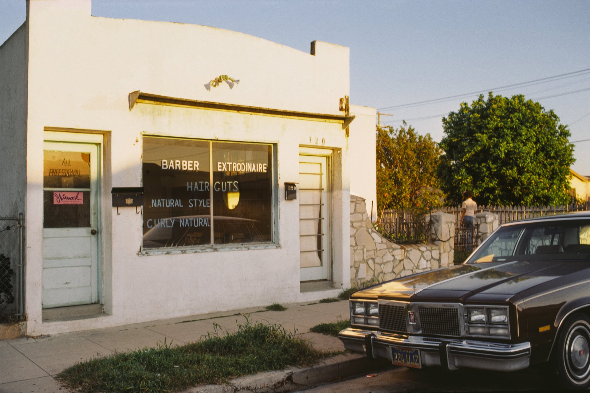  JANET DELANEY  Barber Extraordinaire,  1980 Archival Pigment Print, 2026 13 x 19.5 in (33.02 x 49.53 cm), edition of 5 +2AP 28 x 42 in (71.12 x 106.68 cm), edition of 2 + 1AP   INQUIRE  