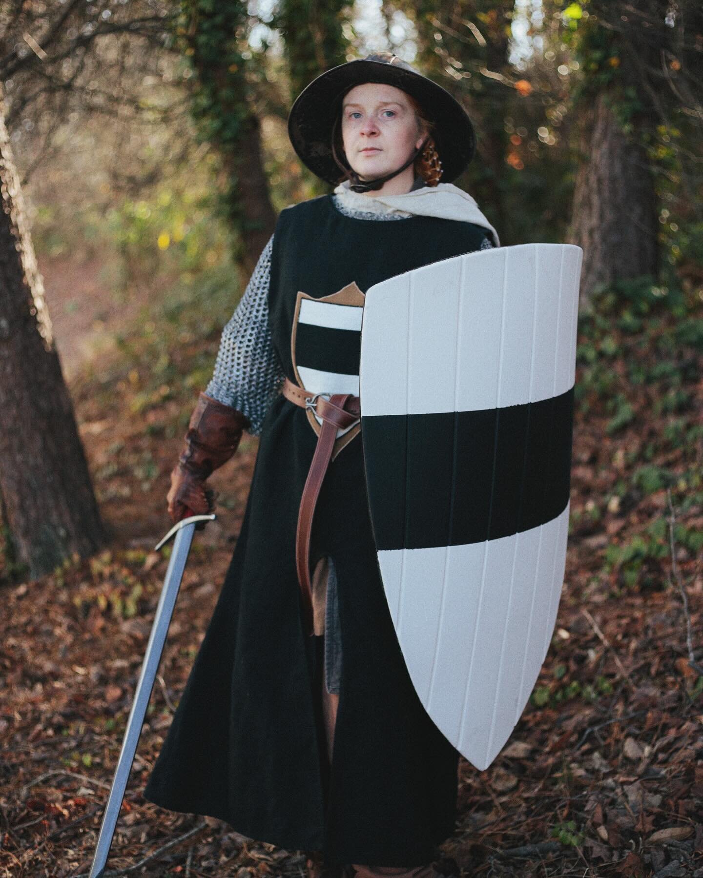BARONY FEATURE: Isolde of Winchester, Baroness of Winchester
Played by: Kristen Wiggins @tolkienerd 
&mdash;
Coat of arms: Argent, a fess sable
Surcoat Color: Black
&mdash;
The warriors of Winchester march into battle bearing the black band on their 