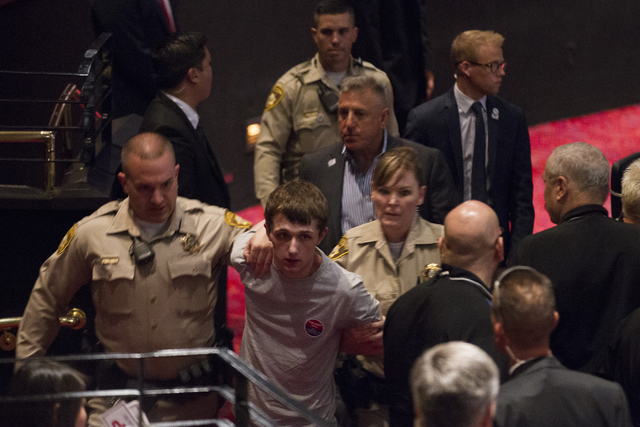 Protester arrested at Trump rally in Vegas; Photo: Erik Verduzco/Las Vegas Review-Journal