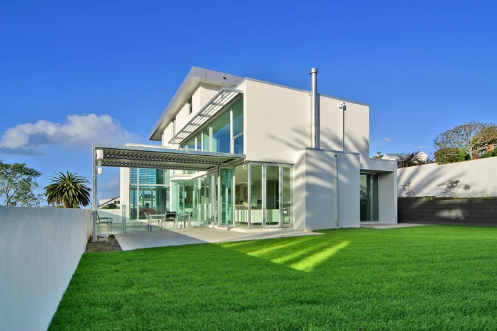 Sang Architects-SAH-lawn and house sunny day.jpg