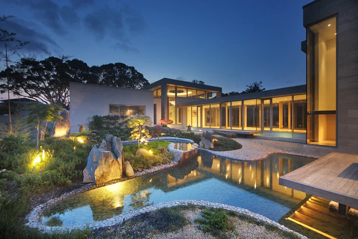 Sang Architects-NSH-garden with pond lite passageway.jpg