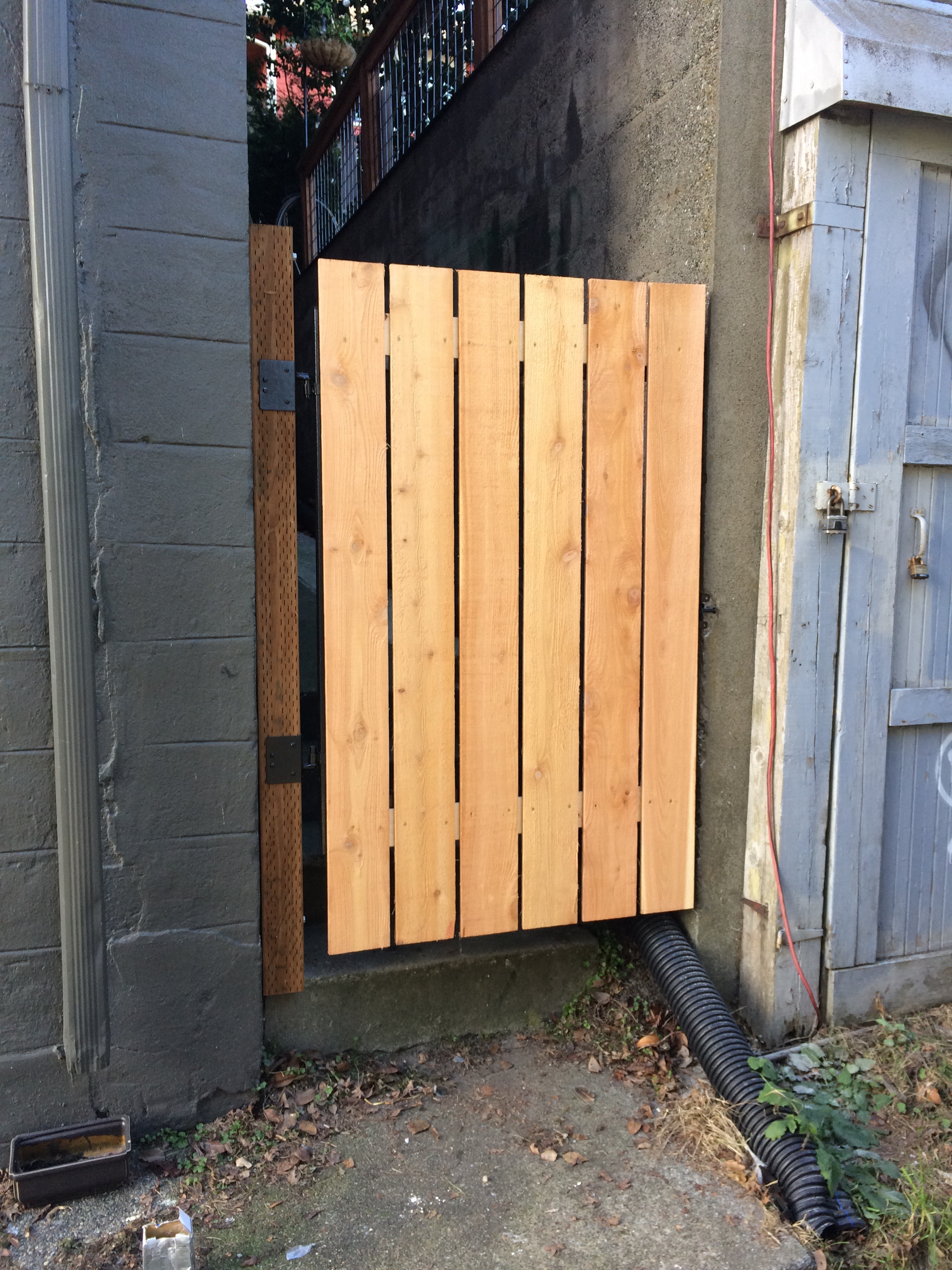 New gate installed in alleyway