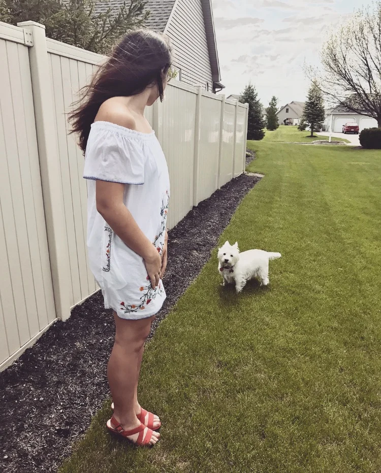 Trying to call my grandparents' dog over to take a picture with me, but he was being a little stubborn at the moment. 
