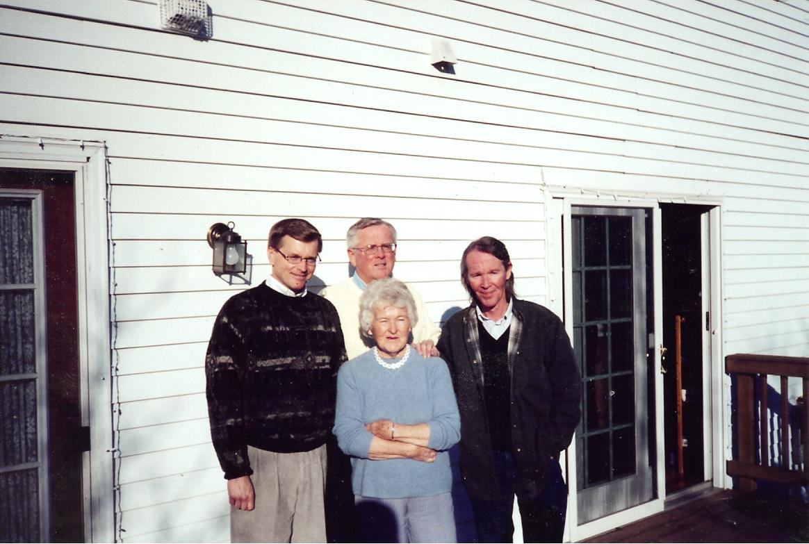 with his Mom and brothers