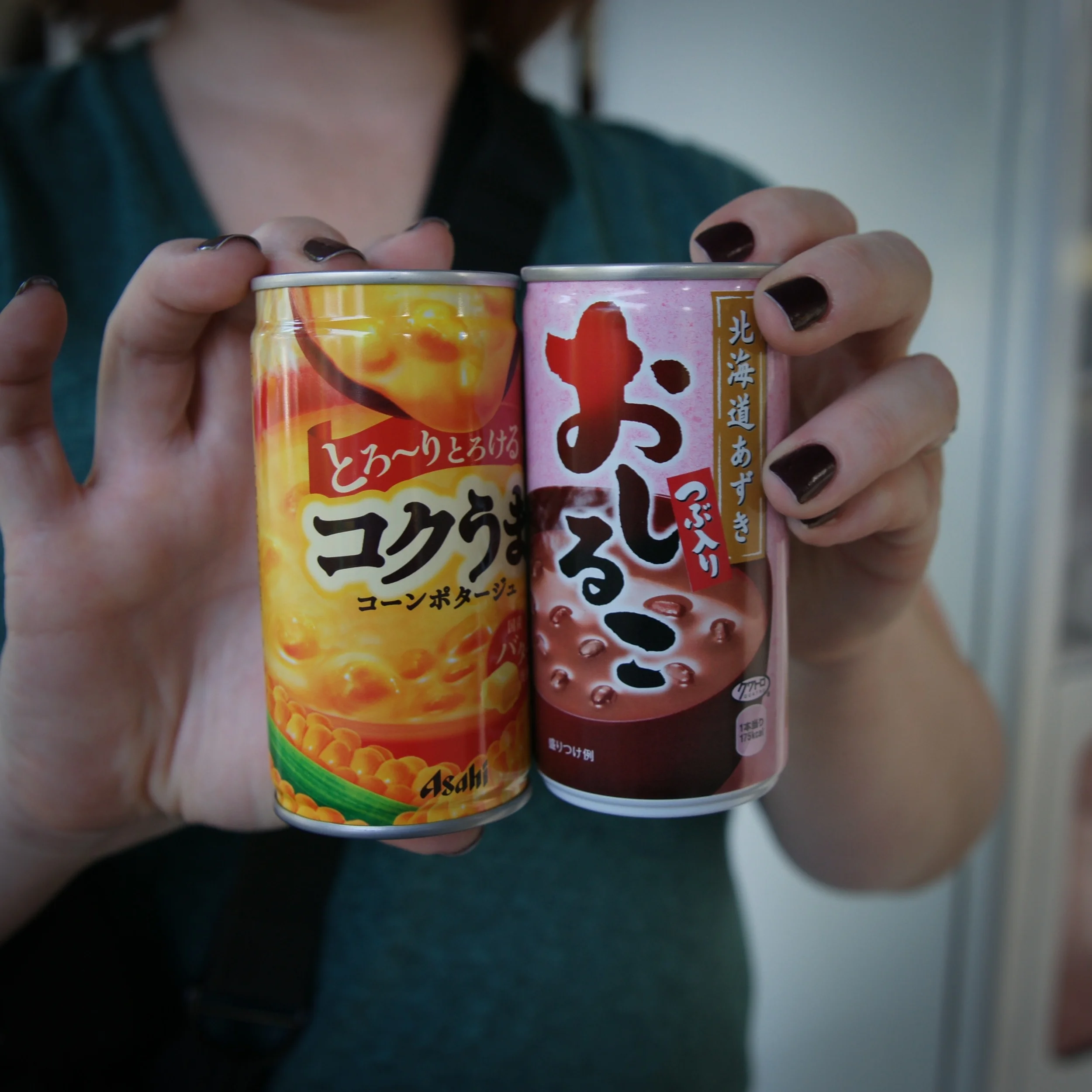 Warm cans of "soup" from vending machine, corn and red bean