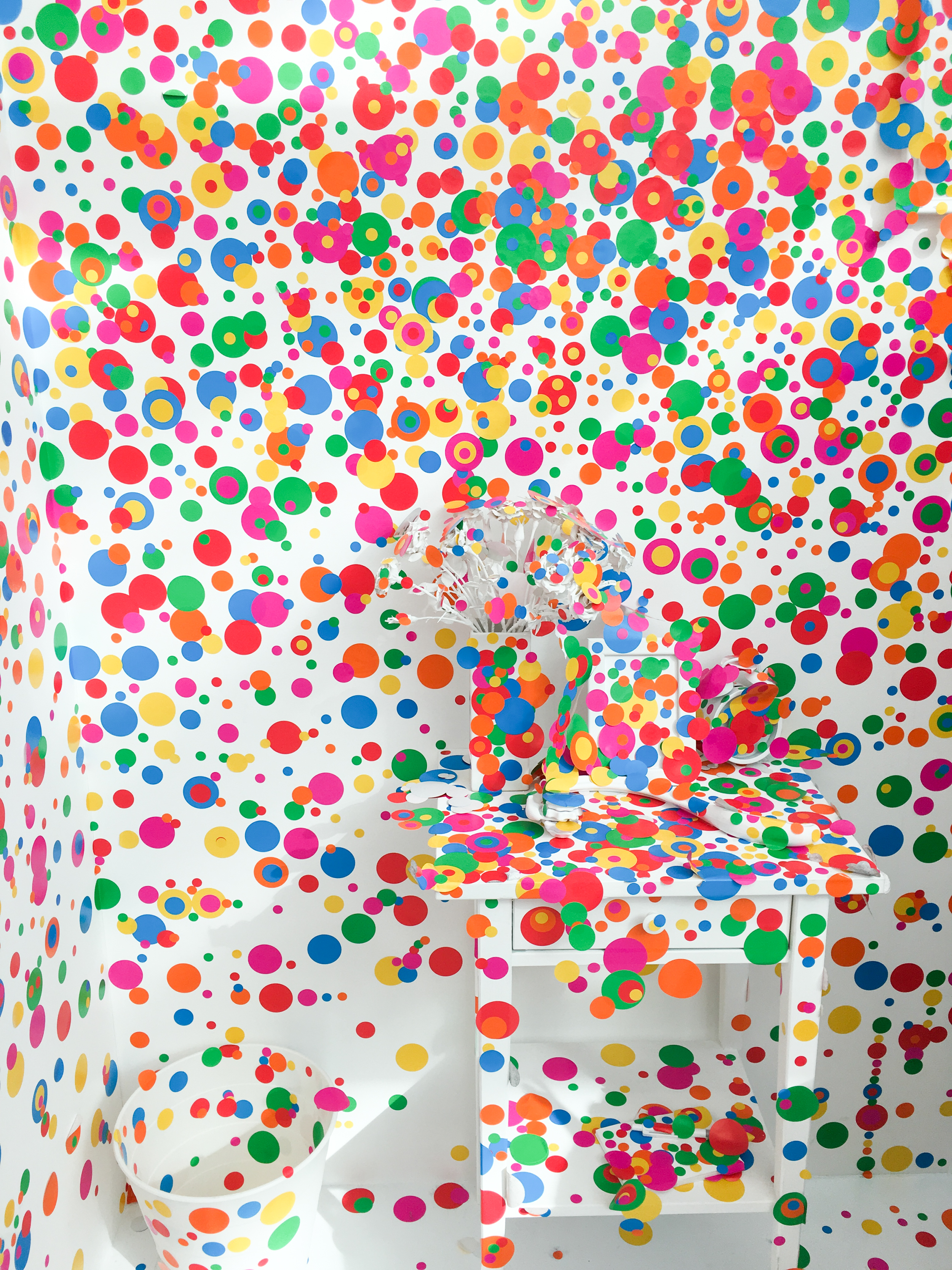 visitors could add dot stickers to a once white room