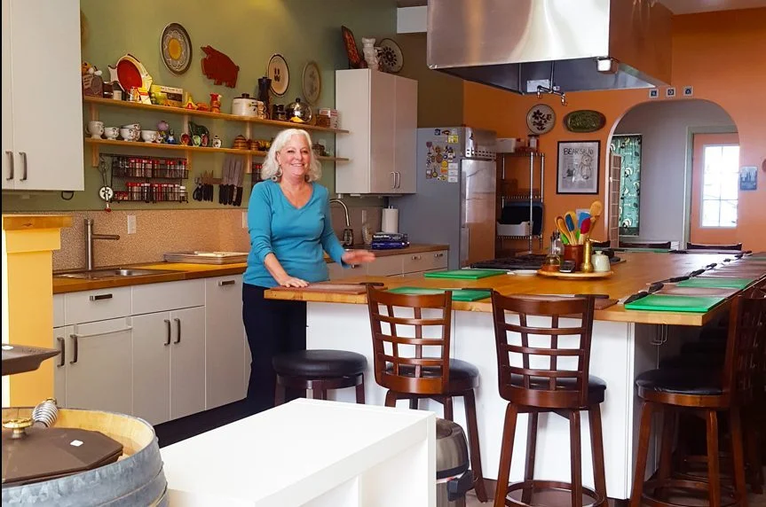 Kim Mahan stands at the counter in her teaching kitchen at Class Cooking in downtown Vancouver. Photo credit: Monika Spykerman