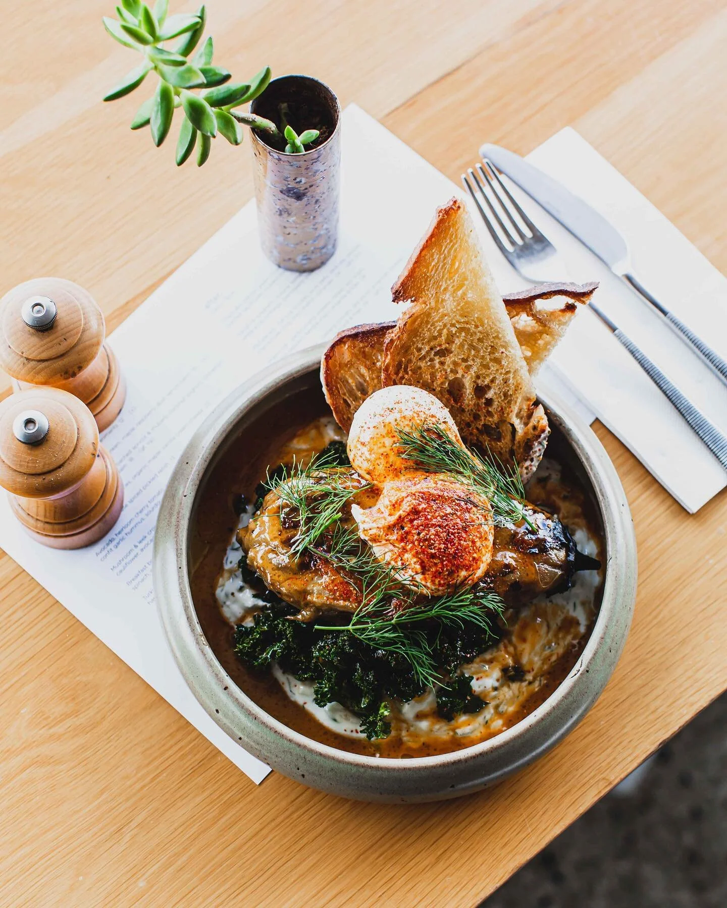 Turkish eggs - burnt aubergine, poached eggs, crispy kale, harissa oil, togarashi, dill yoghurt, crusty bread
Snapped by @rachaelbaskerville 📸
#morningafter #brisbane