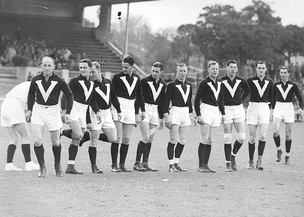 GATHER ROUND heads to Adelaide Oval next week. Adelaide Oval has a long history of hosting interstate football matches prior to AFL being played there. 

In this 1938 photograph you can see the Victorian players wait for the umpire to inspect their b