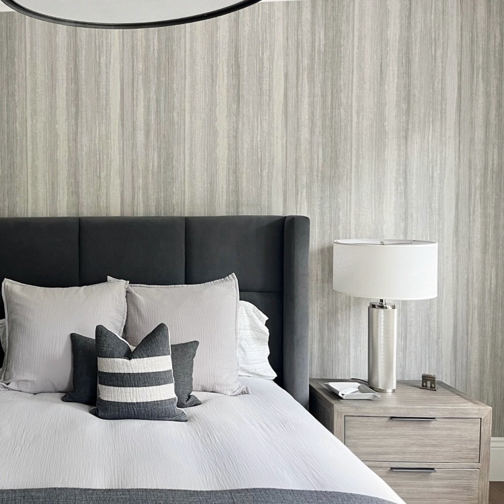 Wallpaper Wednesday! Love a good textured accent wall in a bedroom. 🩶

#livewellinteriors #interiordesign #interiordesigner #instagood #bedroomdesign #wallpaper #decor #custominterior